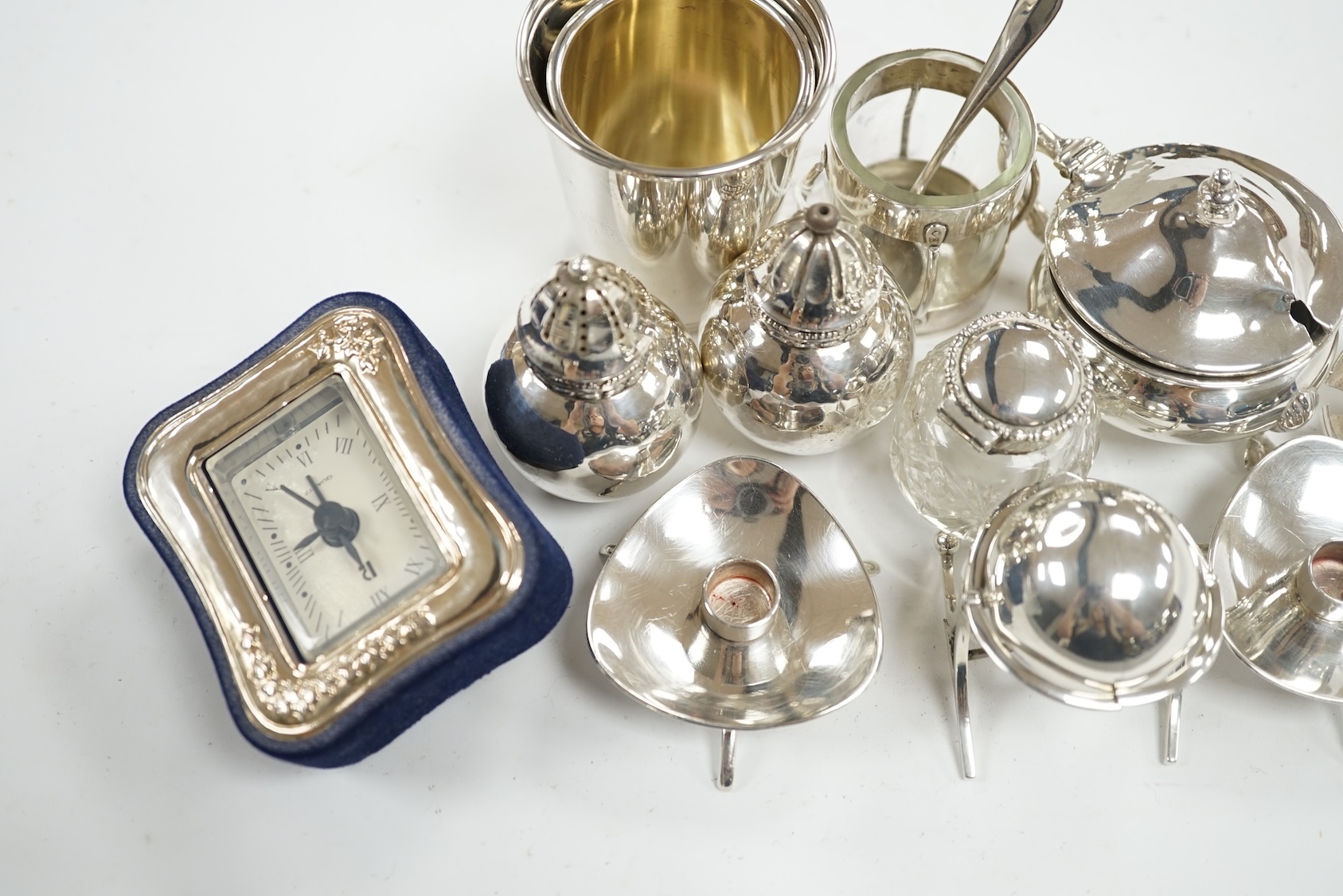 Small silver including an Edwardian miniature silver revolving 'breakfast dish' by Saunders & Shepherd, Birmingham, 1909, height 50mm, four condiments including one modelled as a ship's lamp and two Danish white metal, a